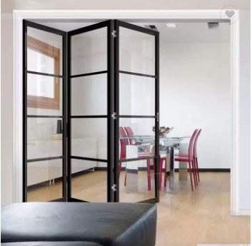 Black frame bifold door between living room and dining room