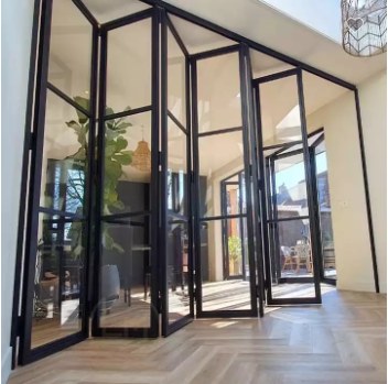 Full-height bifold glass door in a modern home