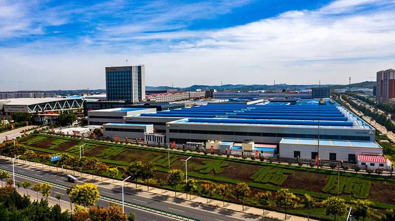 Factory campus aerial view with blue-roof workshops