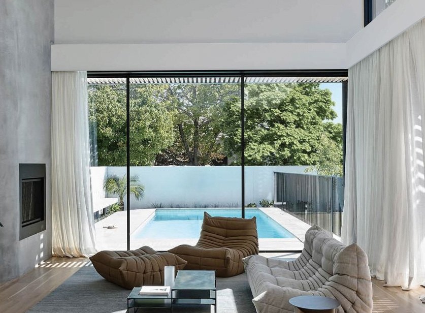 Panoramic sliding glass patio door in a modern living space